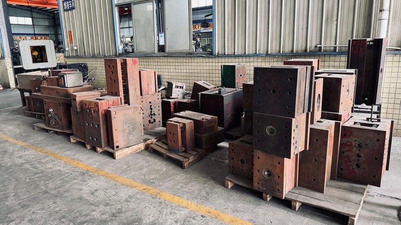 Precision steel injection mold tooling for commercial food slicer components